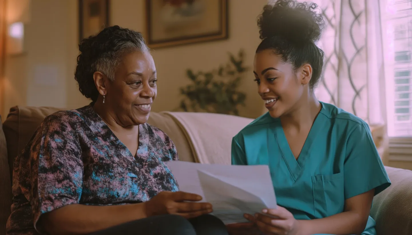 A woman looks at medicare options with a nurse