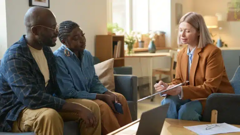 social-services-worker-consulting-black-couple-